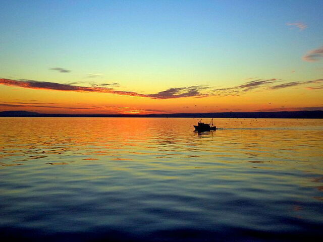 La pêche au coucher du soleil en Toscane