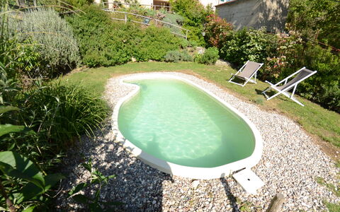 Al Colle Di Lari: Piscine, Propriété, Paysage Naturel, Herbe, L'Eau, Maison, Immobilier, Loisir, Biens, Paysage