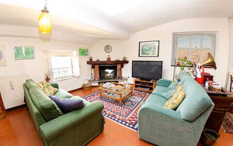 Sinidio: Salon, Meubles, Pièce, Propriété, Design Intérieur, Vert, Canapé, Bâtiment, Immobilier, Table