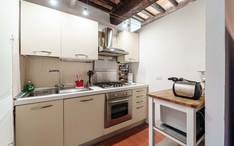 Le Loggine del Pignatello Apartment, Siena City: Appareil De Cuisine, Cuisine, Comptoir, Principaux Appliance, Cabinetry, Cuisinière, Électroménager, Le Fourneau, Evier, Design Intérieur