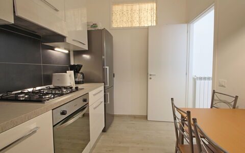 Il Centro: Appareil De Cuisine, Cuisine, Comptoir, Principaux Appliance, Sol, Design Intérieur, Meubles, Bois, Sol, Cabinetry