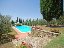 The swimming pool has breathtaking views over the vineyards and is surrounded by Olive groves